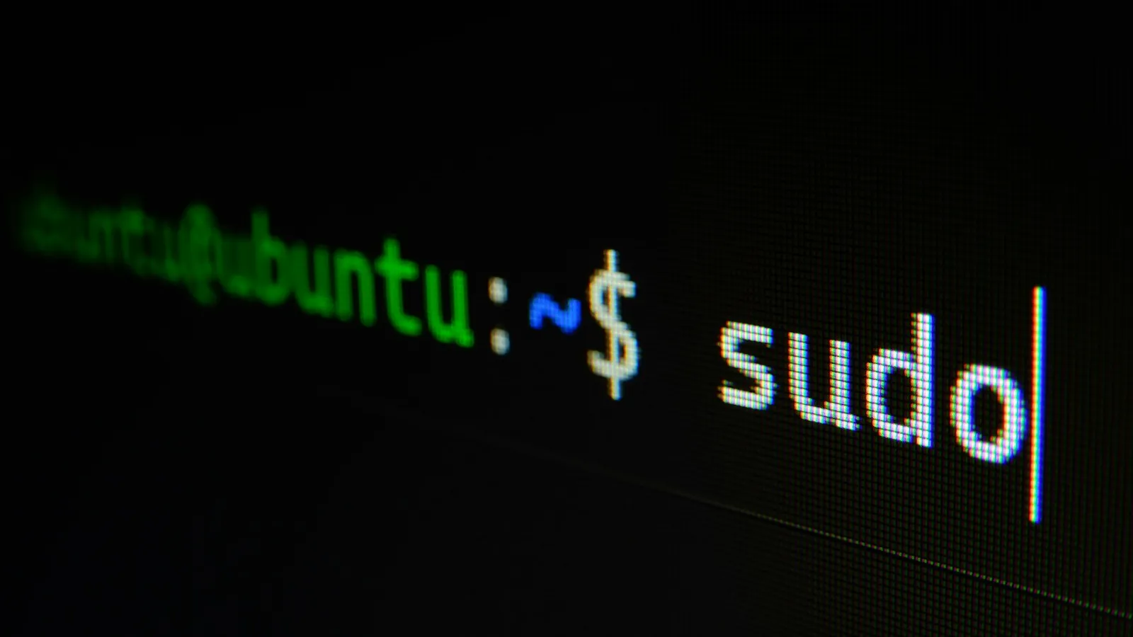 Dark terminal window with green text on a laptop screen